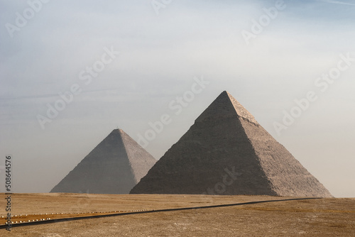 The great Egyptian pyramids. The deserted landscape with Khufu and Khafre pyramids.