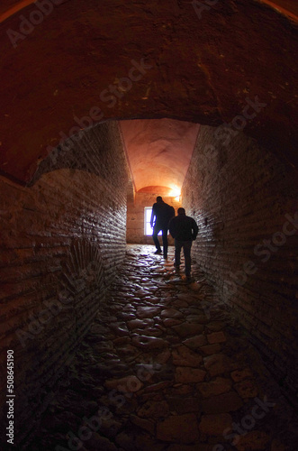 person walking in the tunnel