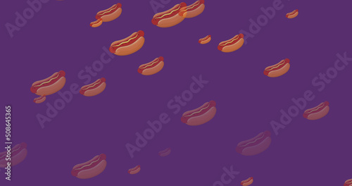 Image of falling hot dogs icons on purple background © vectorfusionart