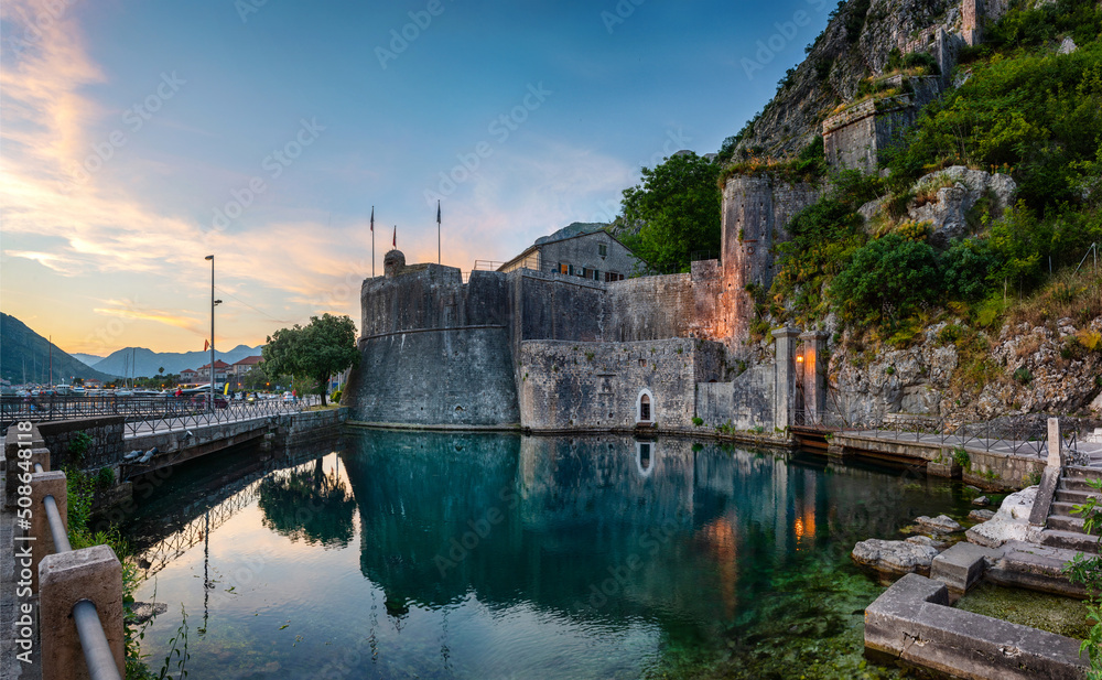 Panoramic view of south (Gurdic) gate, ancient fortress in Old Town of Kotor. Kotor, Montenegro. Evening panoramic view.