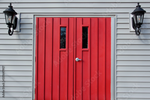 Red wooden door of St. John’s Episcopal Church Westwood MA USA photo