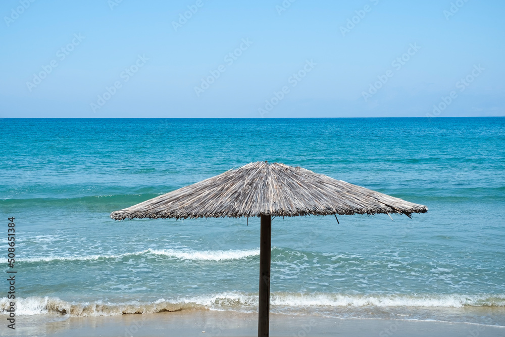 Parasol on the beach in Corfu
