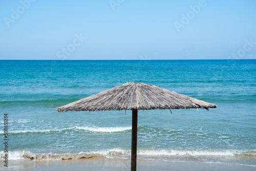 Parasol on the beach in Corfu