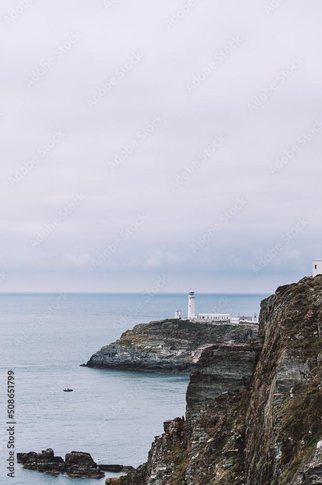 South Stack Lighthouse, Wales, Anglesey, UK. It is built on the summit of a small island off the north-west coast of Holy Island. It was built in 1809 to warn ships of the dangerous rocks below.
