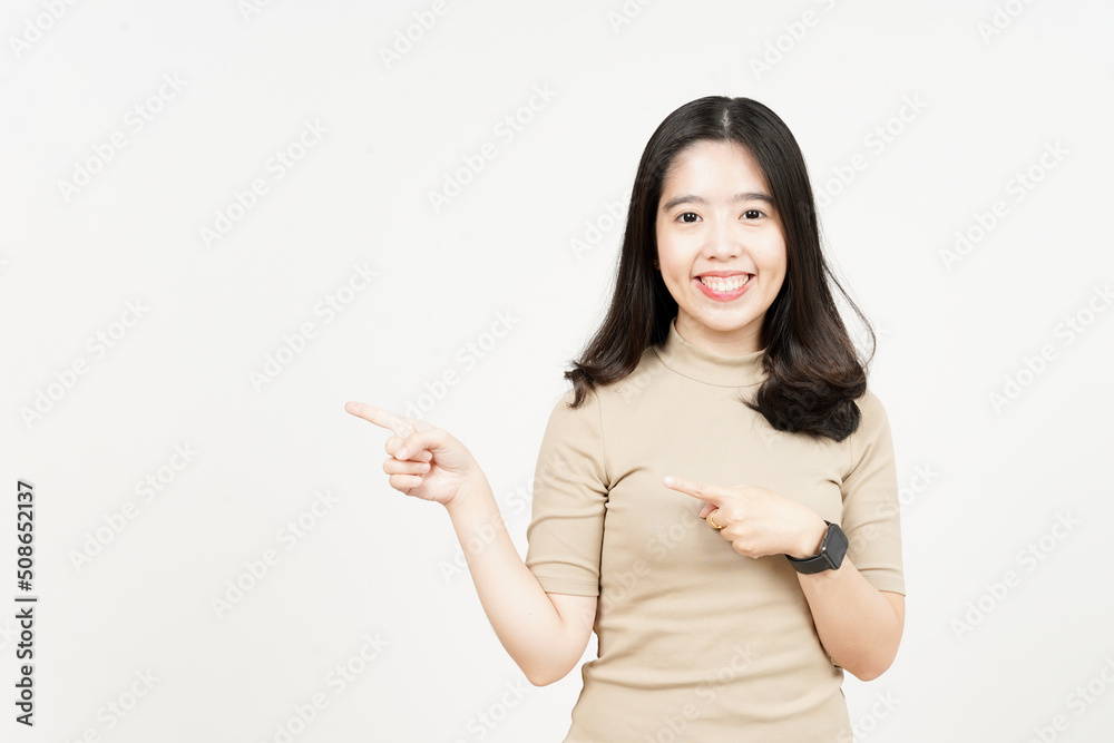 Showing Product and Pointing Side Of Beautiful Asian Woman Isolated On White Background Showing Product and Pointing Side Of Beautiful Asian Woman Isolated On White Background