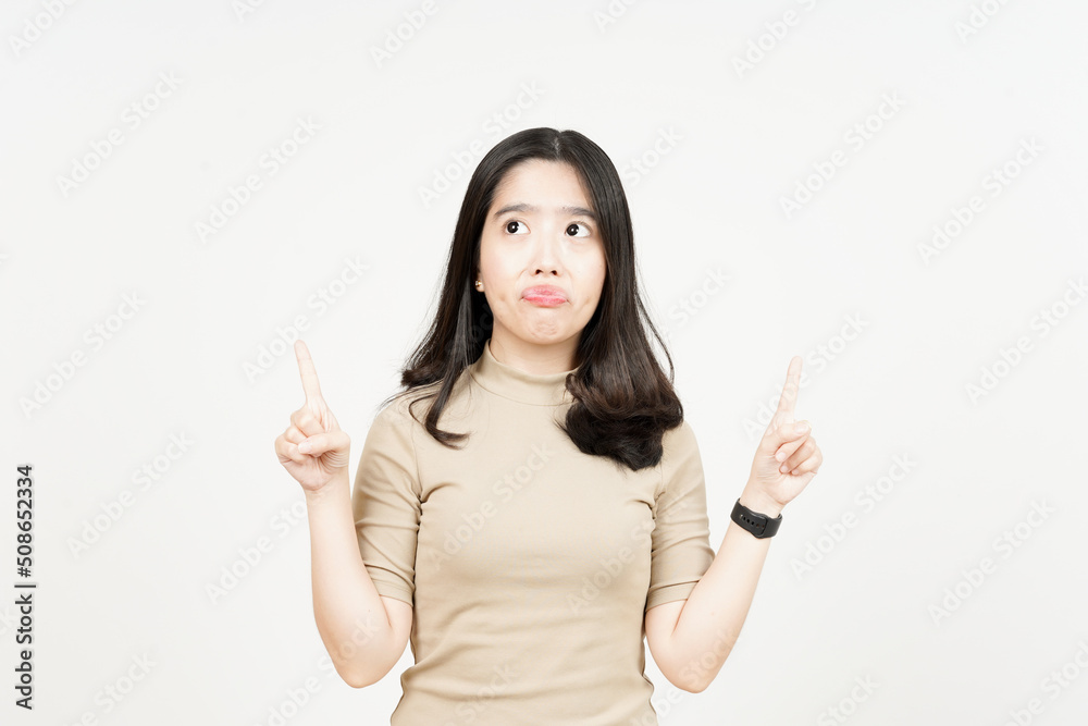 Showing Product and Pointing Up Of Beautiful Asian Woman Isolated On White Background Showing Product and Pointing Up Of Beautiful Asian Woman Isolated On White Background