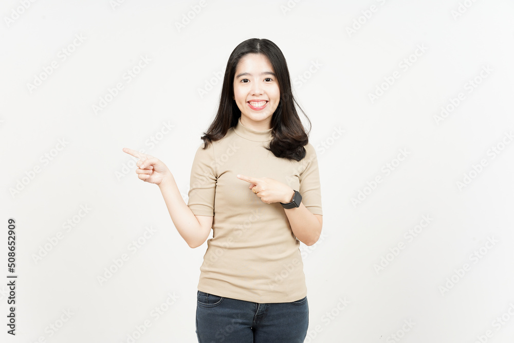 Showing Product and Pointing Side Of Beautiful Asian Woman Isolated On White Background Showing Product and Pointing Side Of Beautiful Asian Woman Isolated On White Background