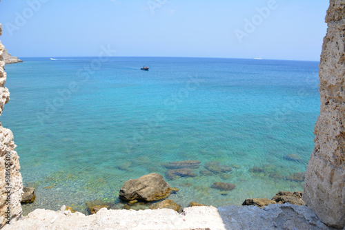 coastline of mediterranean sea through the frame of window