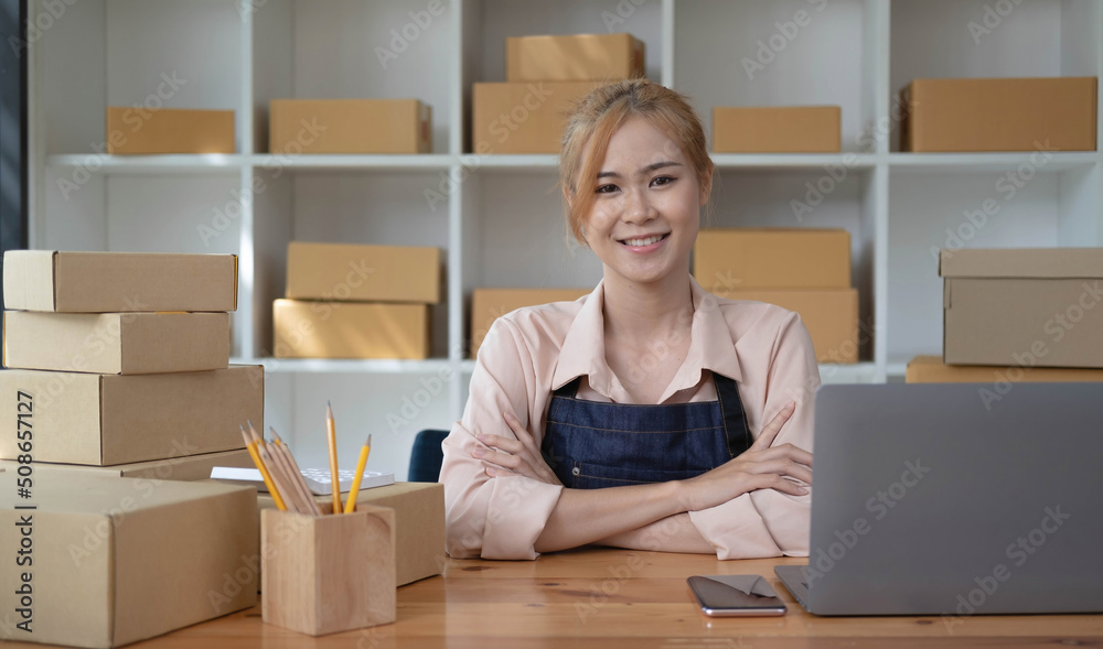 Portrait of beautiful owner asian woman freelancer sme business online shopping working and look at camara - Business online shipping and delivery Portrait of beautiful owner asian woman freelancer sme business online shopping working and look at camara - Business online shipping and delivery