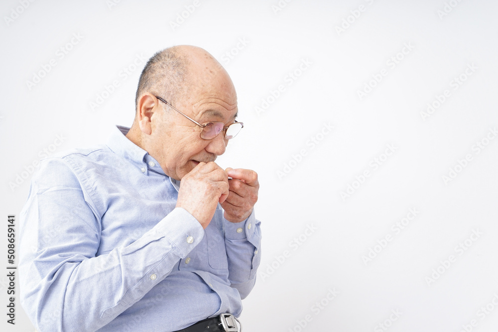 Aged man sitting on the chair Aged man sitting on the chair