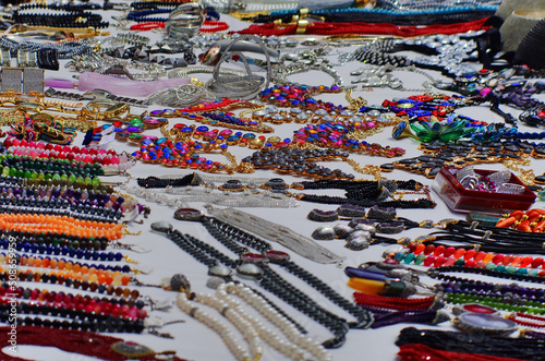 colorful rosary on a white tablecloth