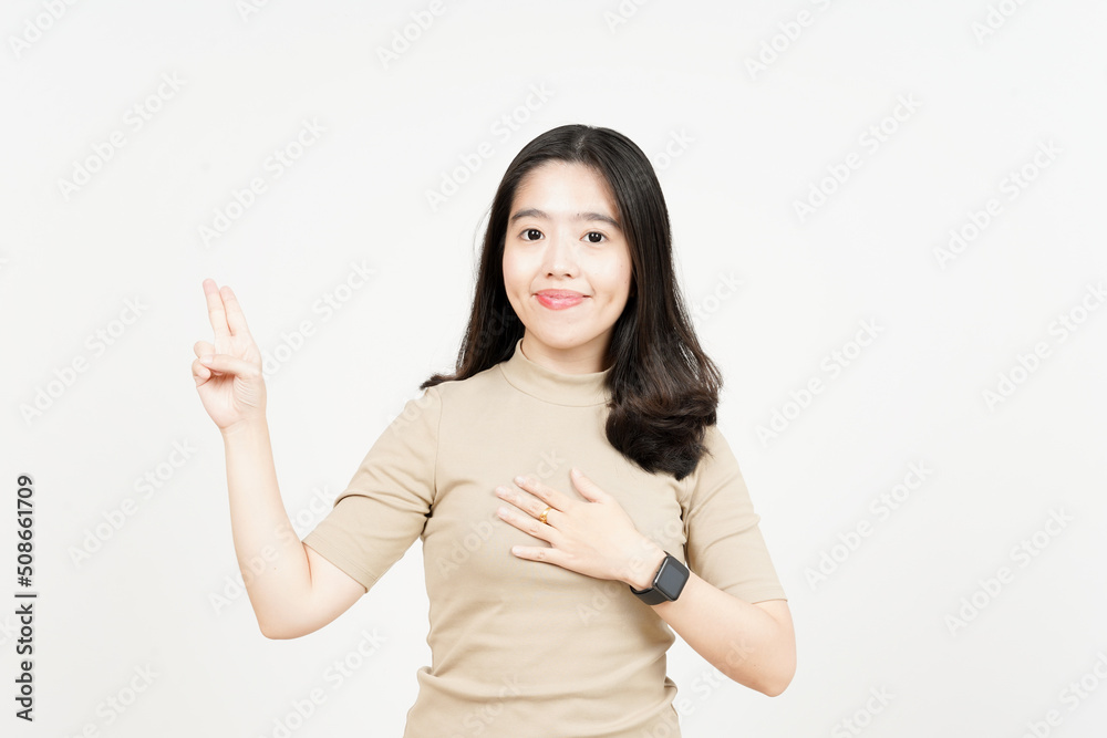Swearing or Promise Gesture Of Beautiful Asian Woman Isolated On White Background Swearing or Promise Gesture Of Beautiful Asian Woman Isolated On White Background