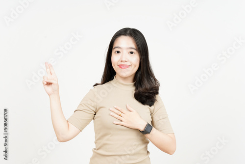 Swearing or Promise Gesture Of Beautiful Asian Woman Isolated On White Background
