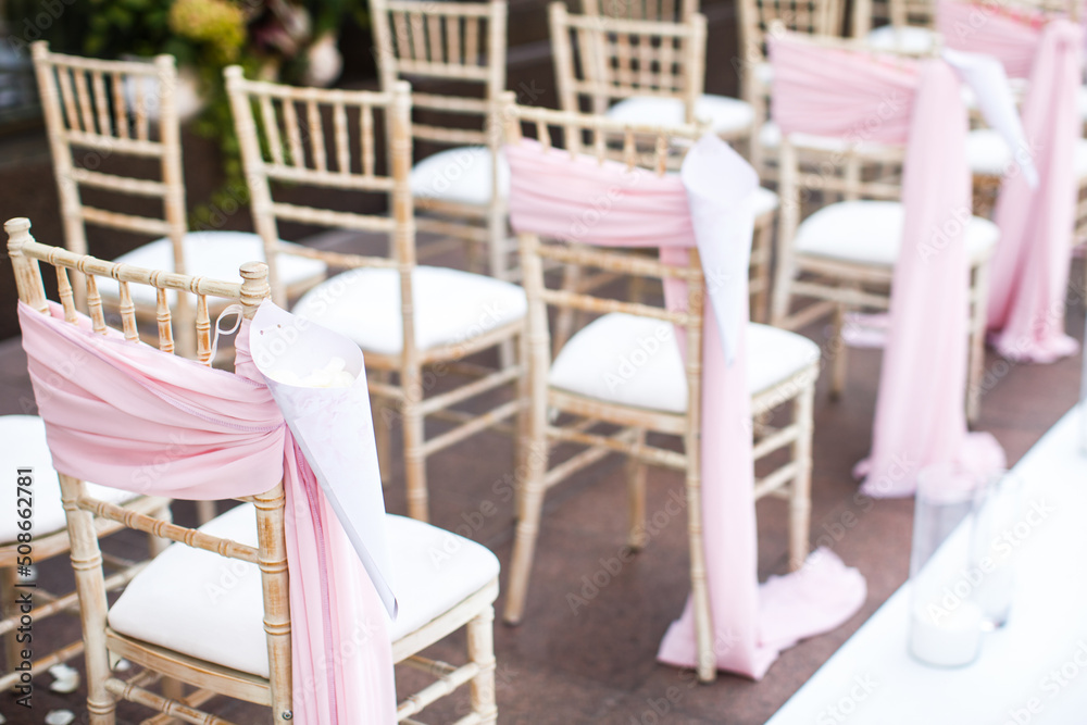 Rows of chairs for the guests at a wedding ceremony