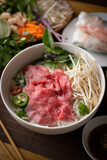 authentic vietnamese pho rice noodle with raw beef