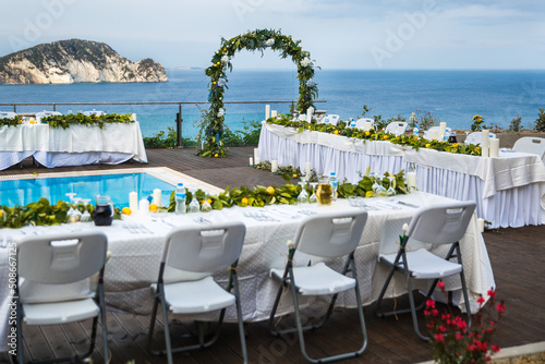 Outdoor wedding ceremony on the roof of the hotel by the sea