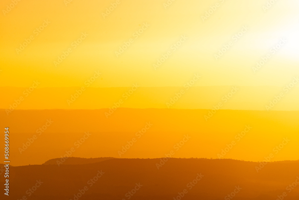 Scenic View of Golden Mountains Ridges Layers at Sunset Time Scenic View of Golden Mountains Ridges Layers at Sunset Time