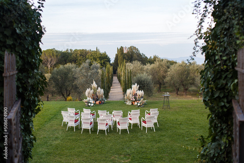 Outdoor wedding ceremony in the olive garden