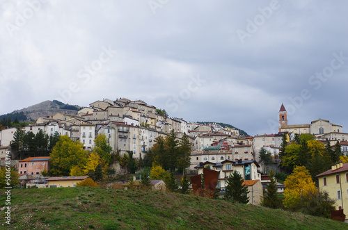 The small tourist village of Rivisondoli with intense autumn colors photo