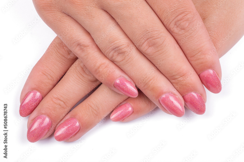 Woman's hands with pink nails manicure Isolated on white background. Woman's hands with pink nails manicure Isolated on white background.
