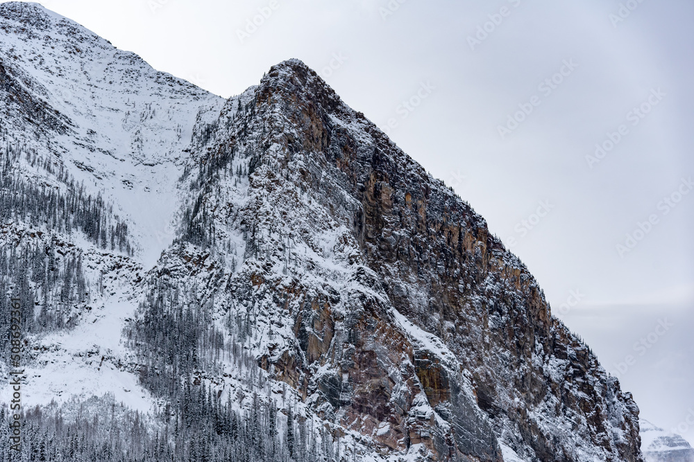 Wallpaper, desktop background image of snow covered mountain in winter season at Lake Louise. 