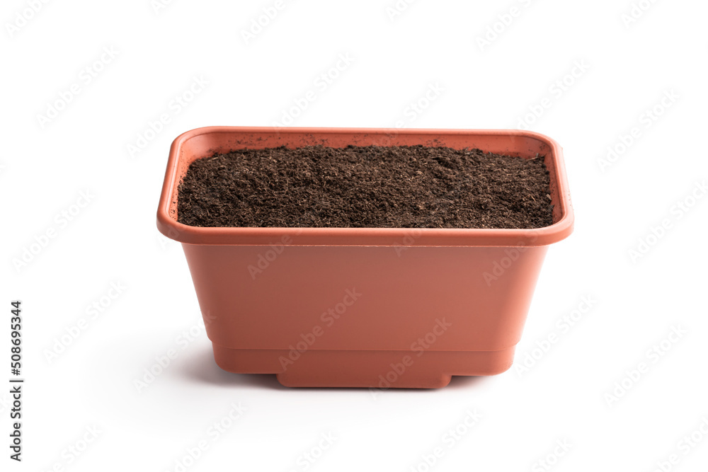 Rectangular pot filled with organic potting soil isolated on white background Rectangular pot filled with organic potting soil isolated on white background