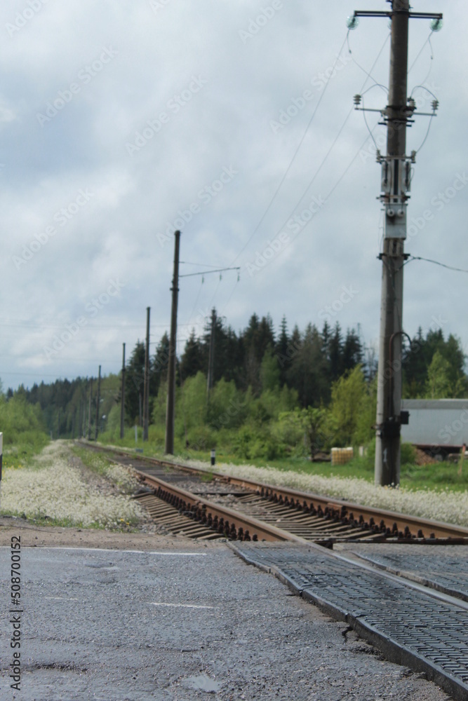 railroad crossing in the countryside