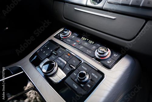 Air condition button inside a luxury car.  © kucheruk