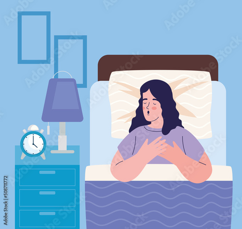 woman sleeping in bedroom
