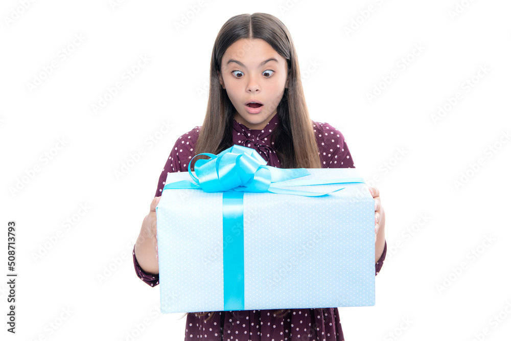 Teenager child with gift box, studio isolated background. Present for birthday, Valentines day, New Year or Christmas. Kid hold present box with gift ribbon bow. Teenager child with gift box, studio isolated background. Present for birthday, Valentines day, New Year or Christmas. Kid hold present box with gift ribbon bow.