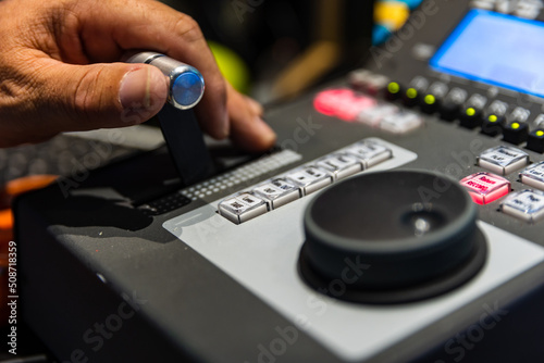 Принти на полотні Operators hand controlling video replay for live broadcast event, shallow focus