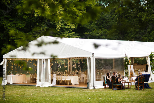 Large wedding awning and a group of musicians
