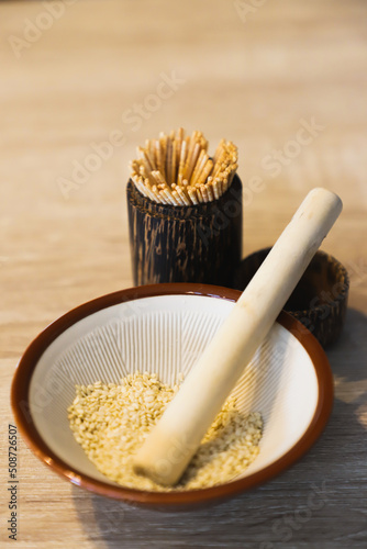 Close up of Sesame grinder on table 