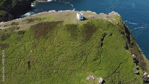 Aerial drone shot of Boscastle, harbour and its rugged coastline. Picturesque seaside village in Cornwall, England. photo