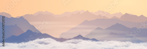 Mountains above the clouds, panoramic view of the ridges in the morning light, picturesque sunrise