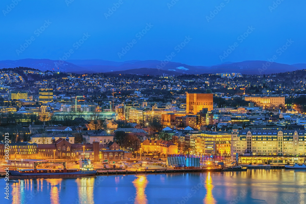 Oslo Norway, night city skyline at business district and Oslo City Hall