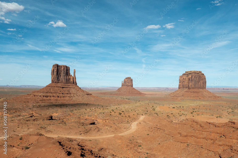 scenic view to monument valley with butte and blue sky scenic view to monument valley with butte and blue sky