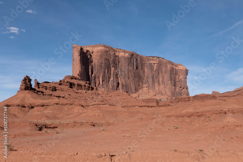 scenic view to monument valley with camel butte and blue sky photo