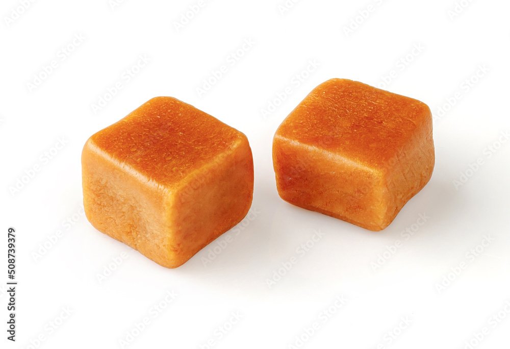 Caramel cubes with isolated on white background. Caramel cubes with isolated on white background.