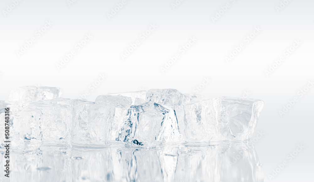 Ice cubes background. Heap of pure ice cubes on a reflective white surface. Ice cubes background. Heap of pure ice cubes on a reflective white surface.