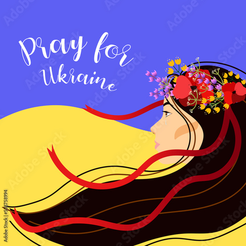 Vászonkép Ukrainian young brown-haired woman in a flower wreath on a blue and yellow background
