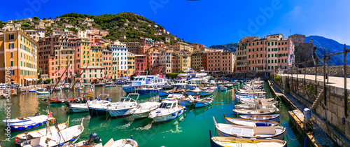 Fotografiet Camogli - beautiful colorful town in Liguria, panorama with traditional fishing boats