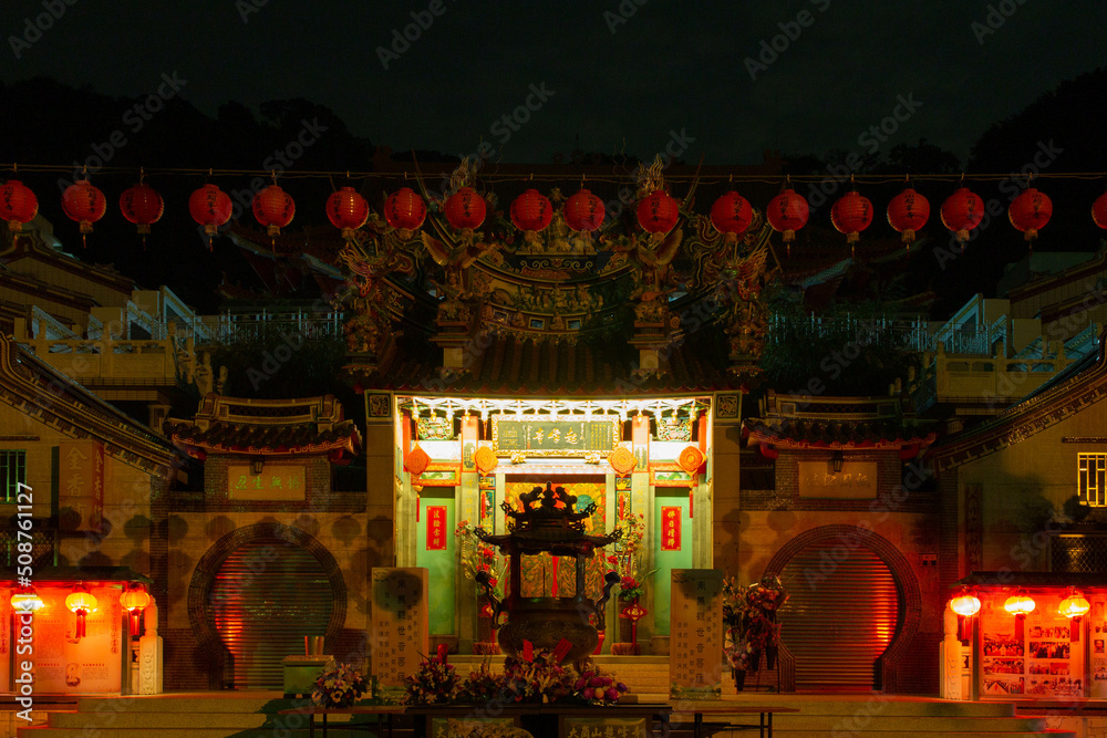 temple in night with flowers and lantern