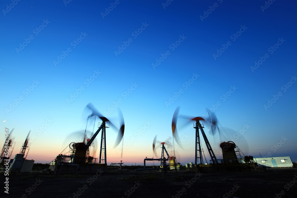 in the evening, oil pumps are running in the evening, oil pumps are running