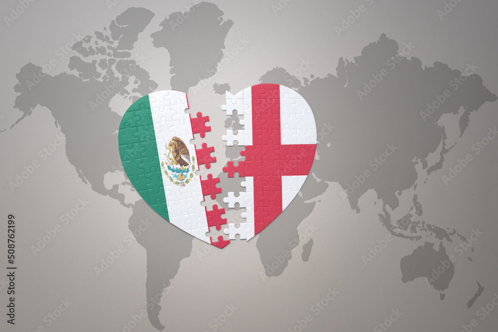 puzzle heart with the national flag of england and mexico on a world map background.Concept. puzzle heart with the national flag of england and mexico on a world map background.Concept.