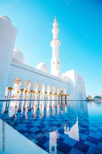 Sheikh Zayed Grand Mosque Minaret View With The Pool And Blue Sky