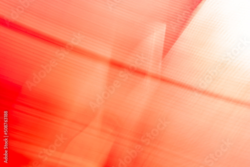 Red-carrot abstract background with diagonal small lines and gradient.