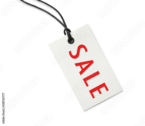 Tag with word SALE on white background