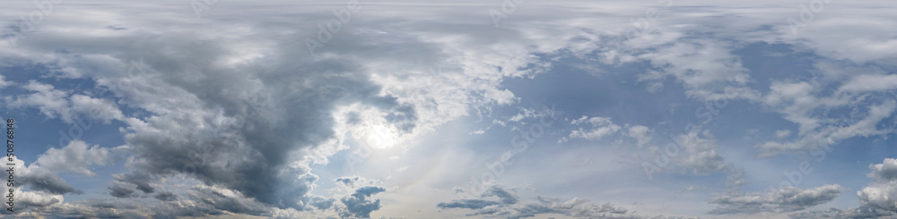 Sky panorama on sunset with Cumulus clouds in Seamless spherical equirectangular format as full zenith for use in 3D graphics, game and in aerial drone 360 degree panoramas for sky replacement.	
