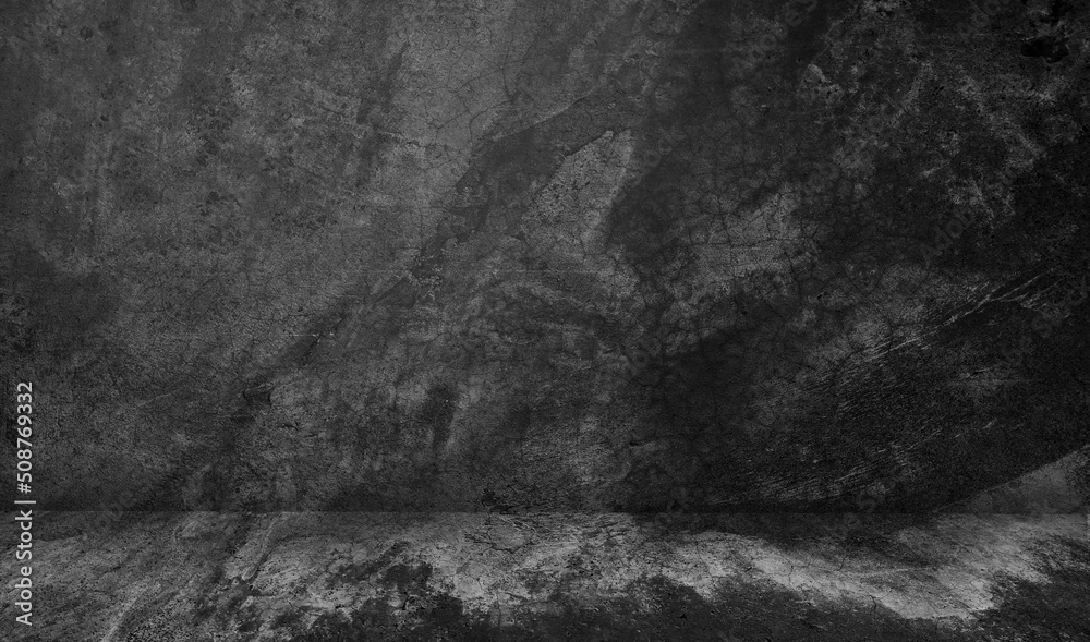 Naklejka premium Black display on dark cement wall in retro concept.